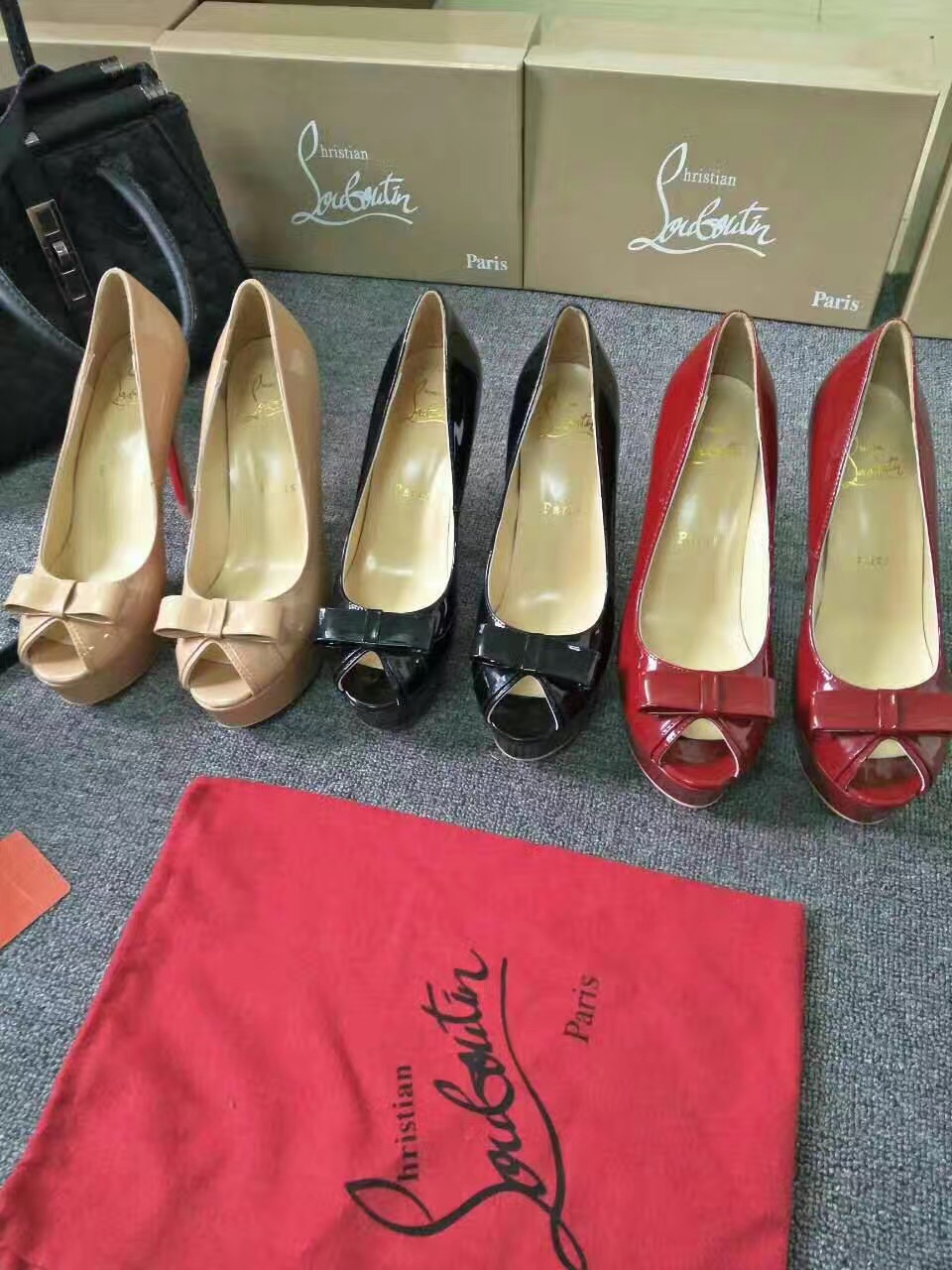 fake designer Christian Louboutin CL paint red soled heels 